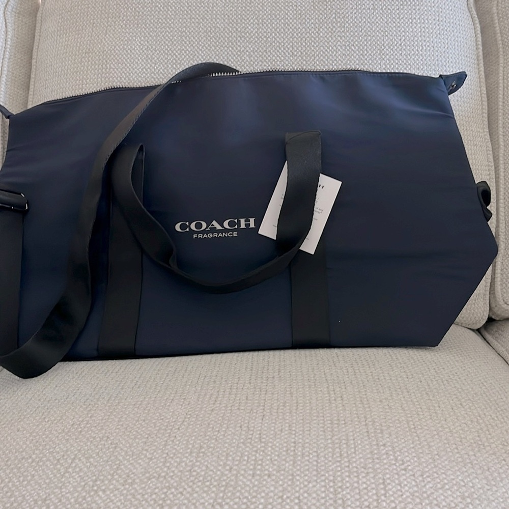 COACH • NWT  “fragrance “ travel/ duffle weekend bag in navy blue • UNISEX
